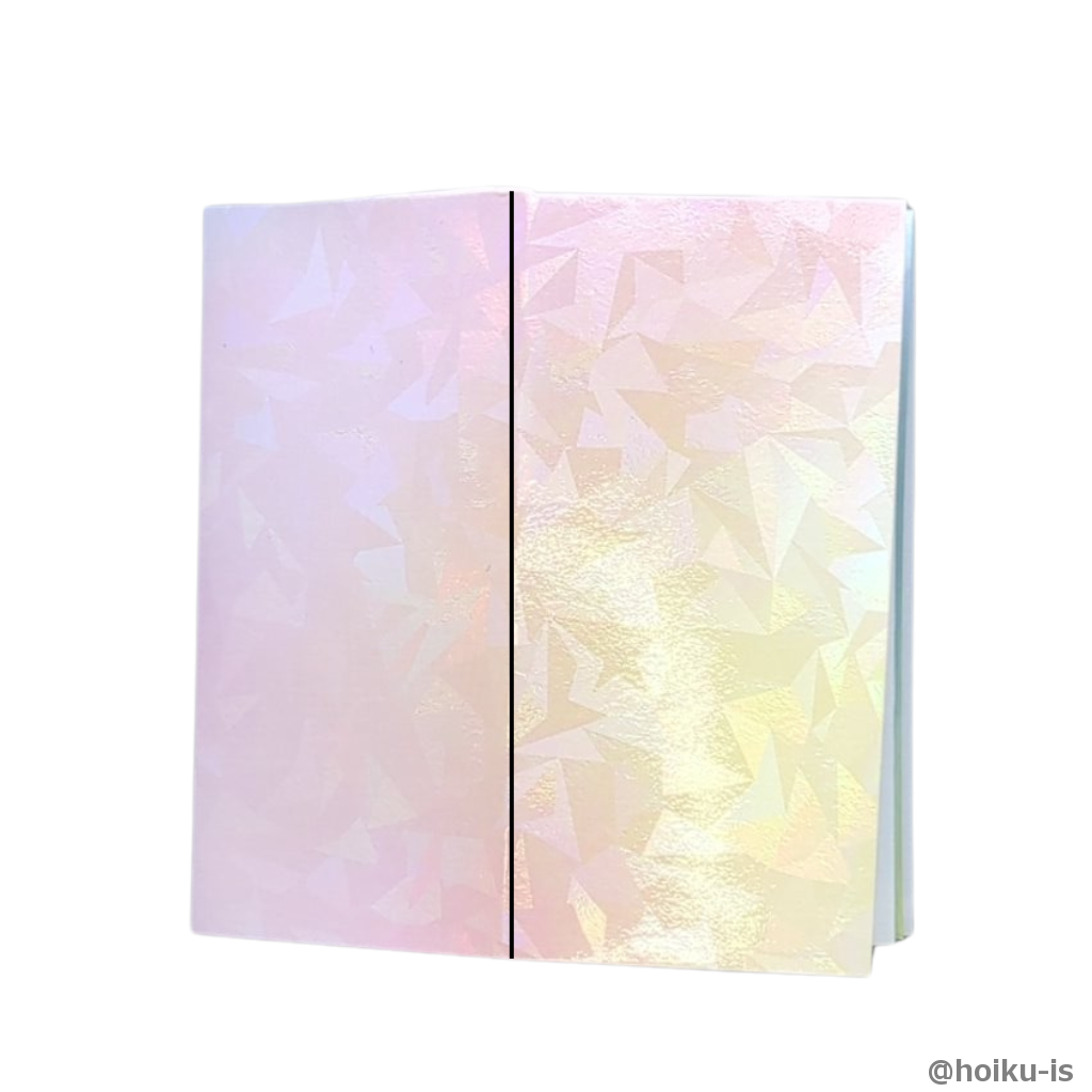 タテに半分に折ります