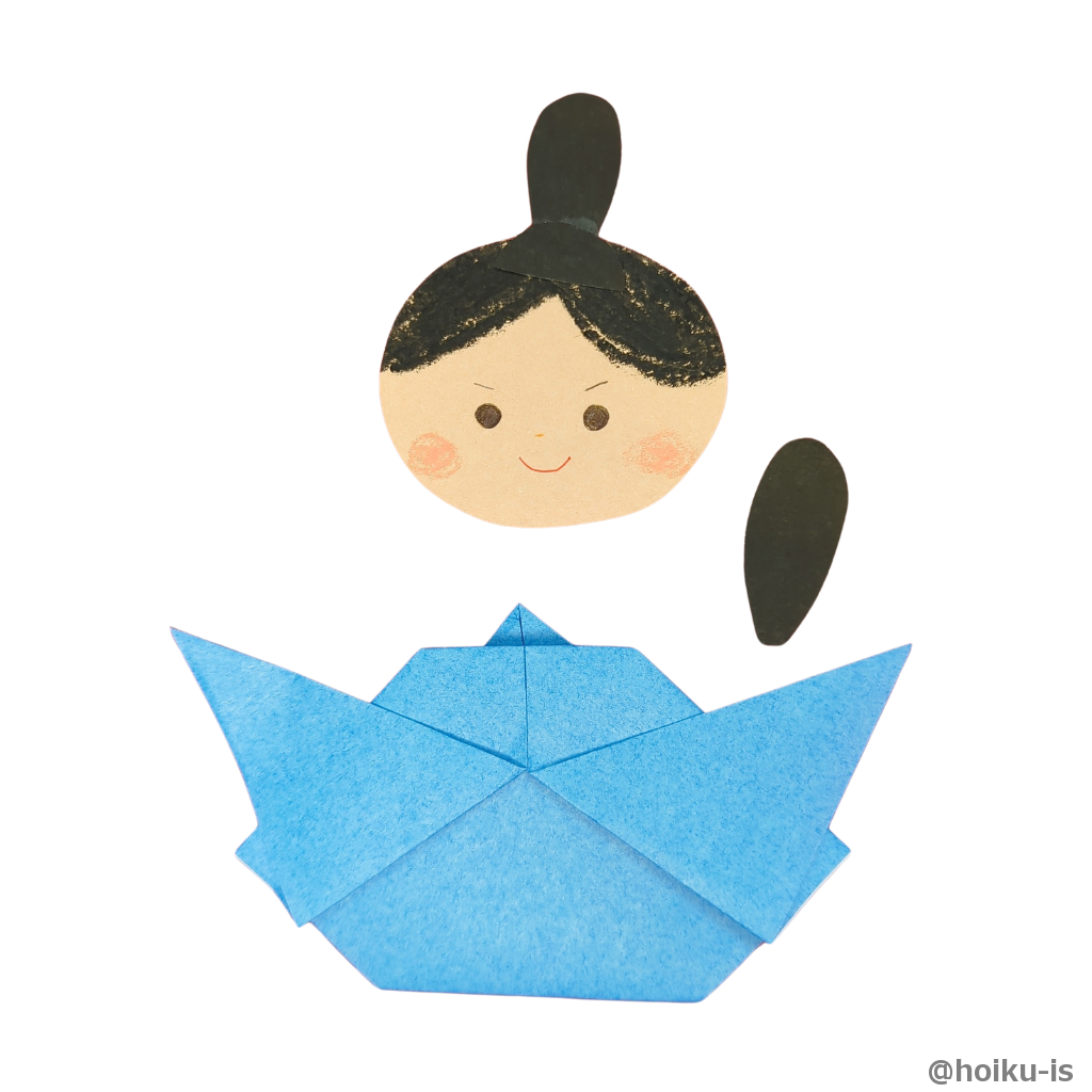 裏返して別で作った顔や笏（しゃく）を付けます