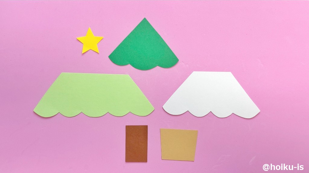 型紙に沿って色画用紙を切る