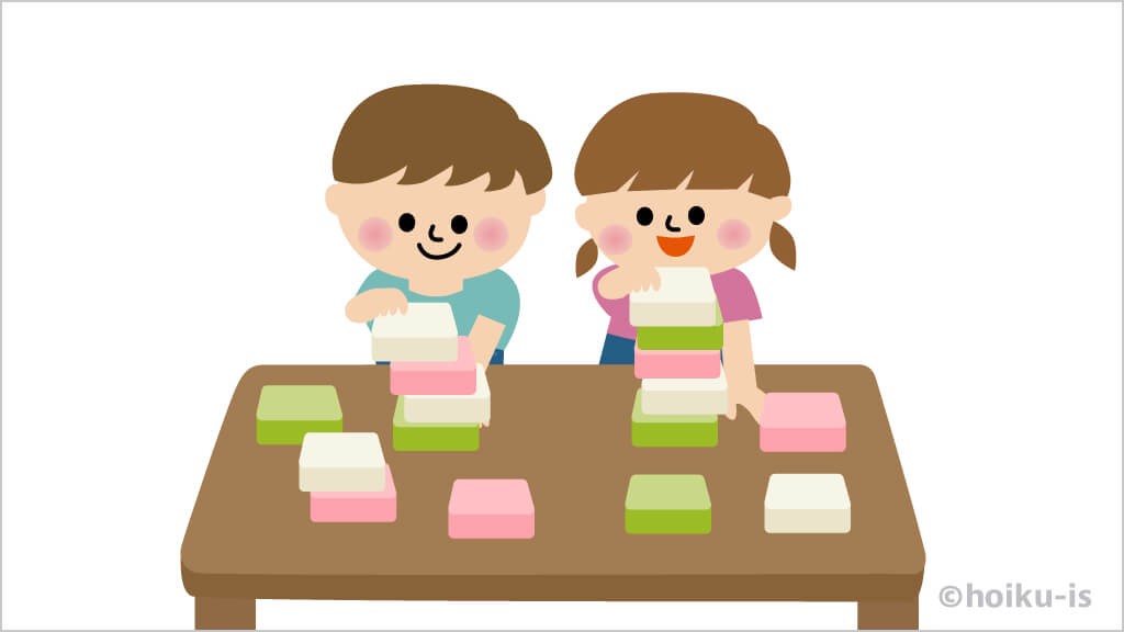 菱餅を積み上げる子どもたち