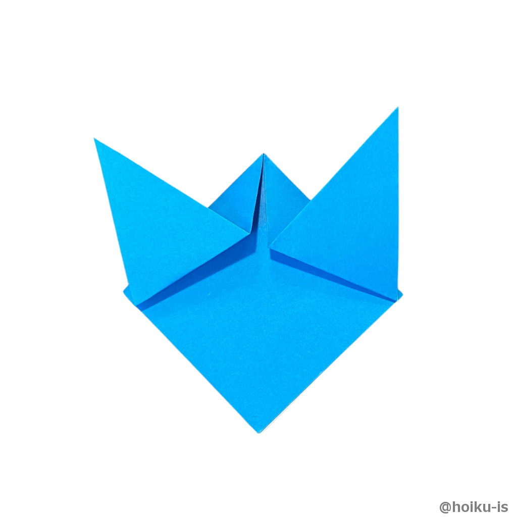 ②で折った辺を上に折り上げる