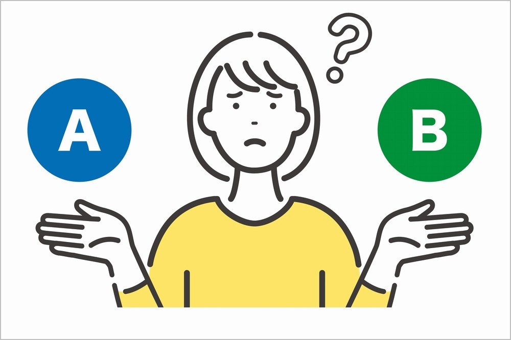 AとBの選択肢のどちらを選ぶか迷っている女性