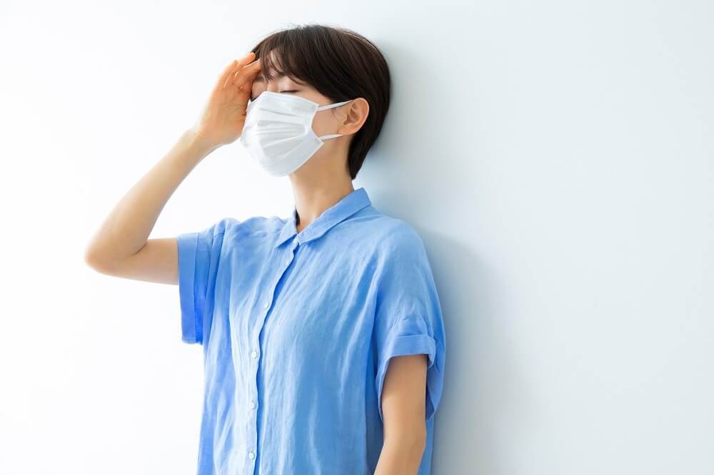 具合が悪そうな女性