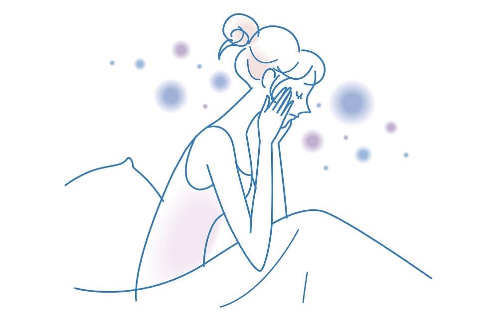 眠りにつけない女性