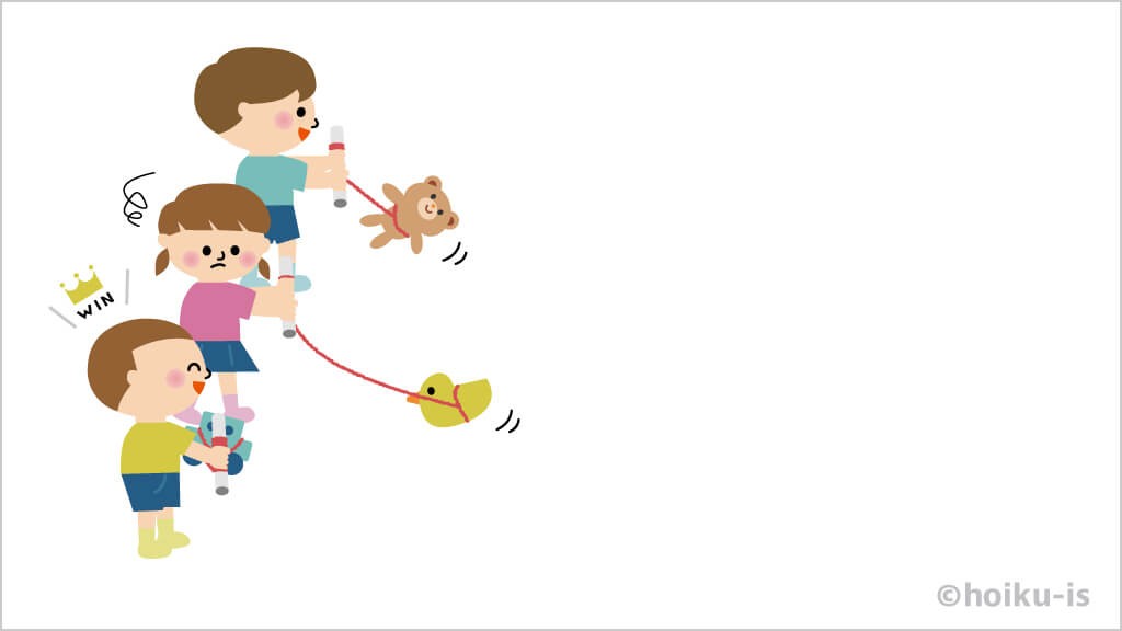 糸巻き競争をする子どもたち