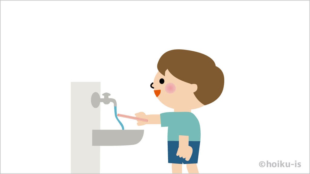 静電気で水の動きを変えている子ども