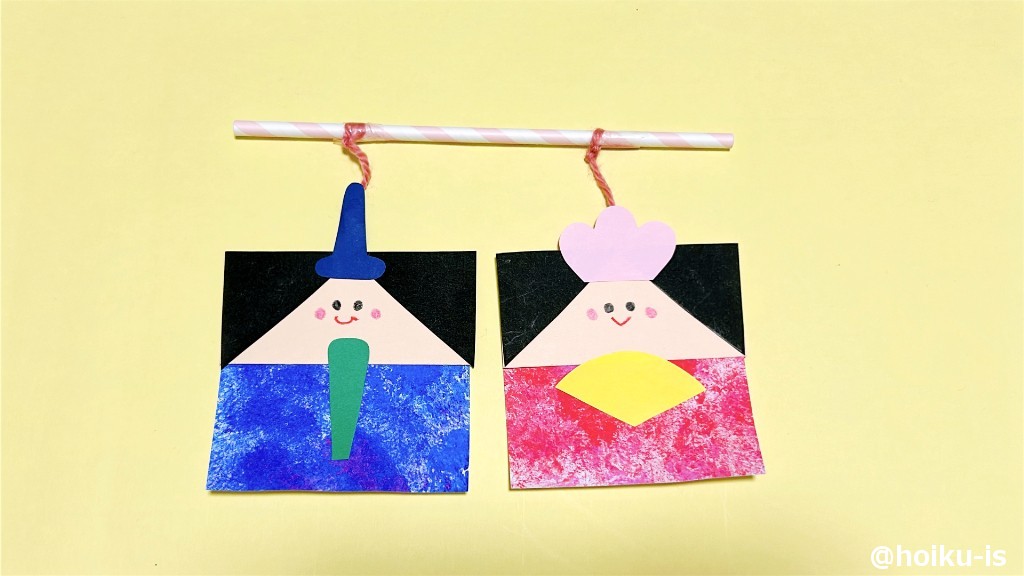 ⑥	ストローにひもをくくりつけ、おひなさまを吊るす