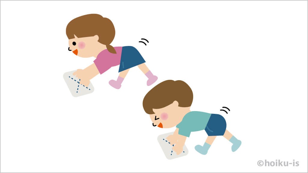雑巾がけをする子どもたち