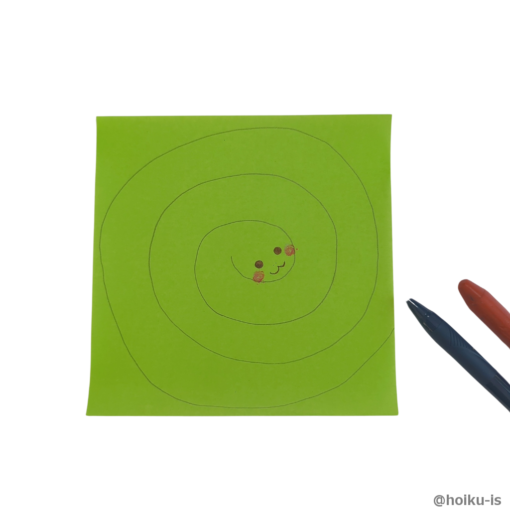 真ん中は顔になるので目や鼻を描きます