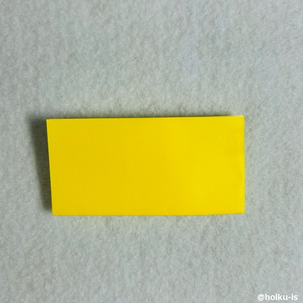 ③横半分に折る