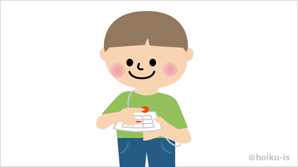 ビンゴのシールを貼る保育園児