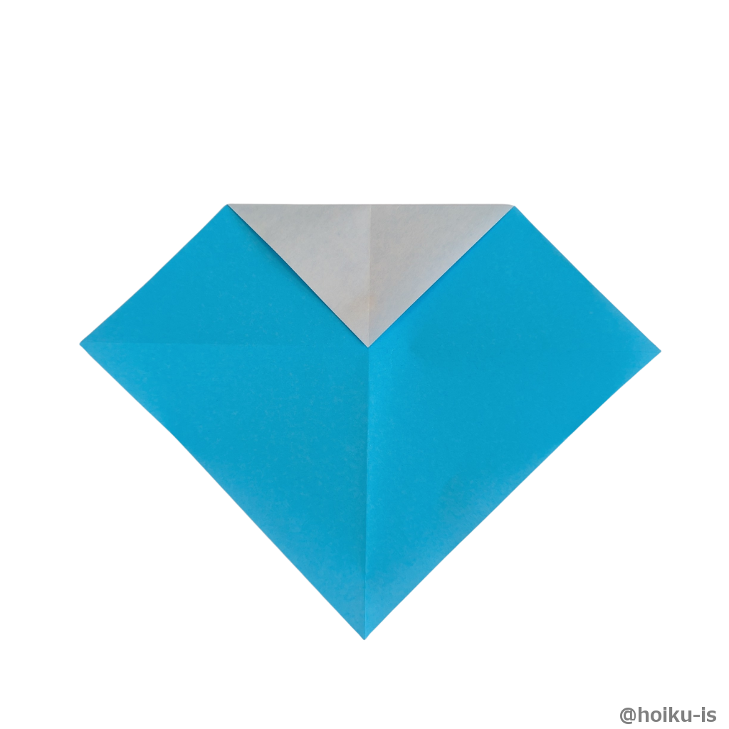 上の角を折り筋の交差するところまで折ります