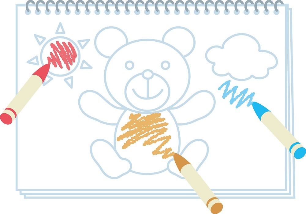 イラストにクレヨンで色をぬっているところ
