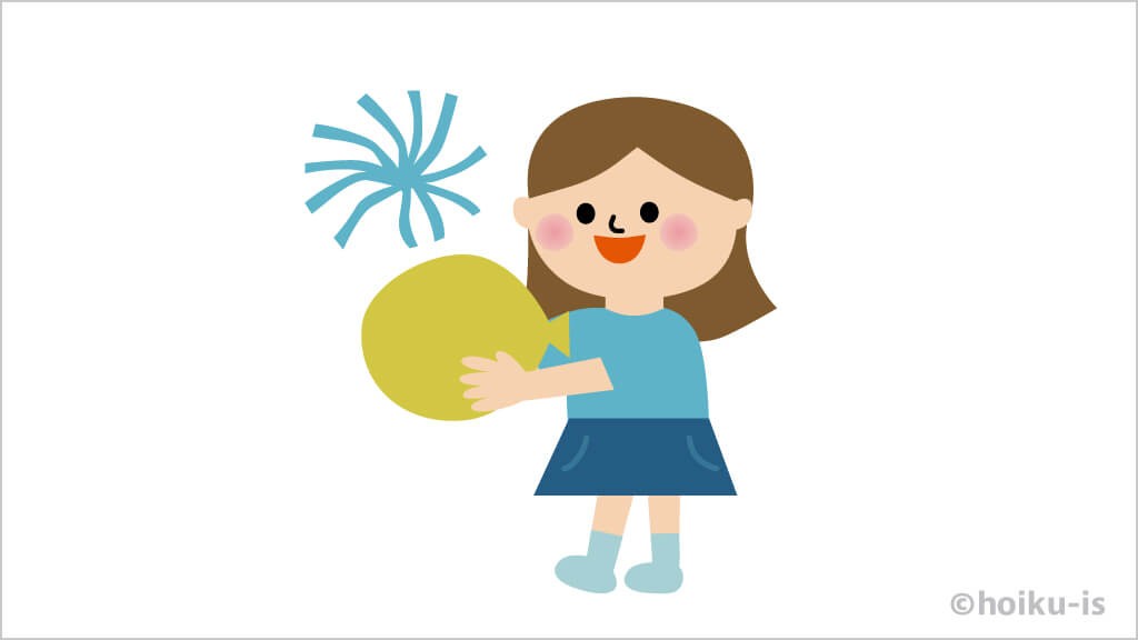 静電気でスズランテープを浮かせる子ども