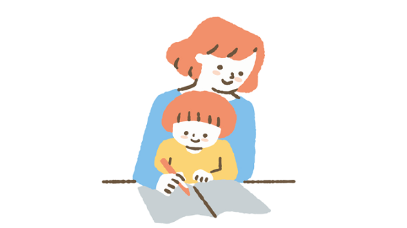 子どもと一緒に文字を書く女性