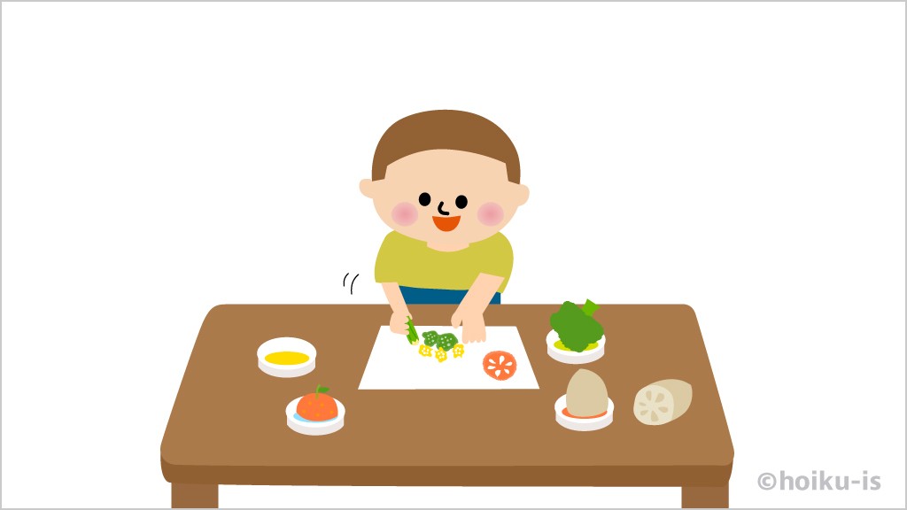 野菜スタンプで絵を描いている子ども