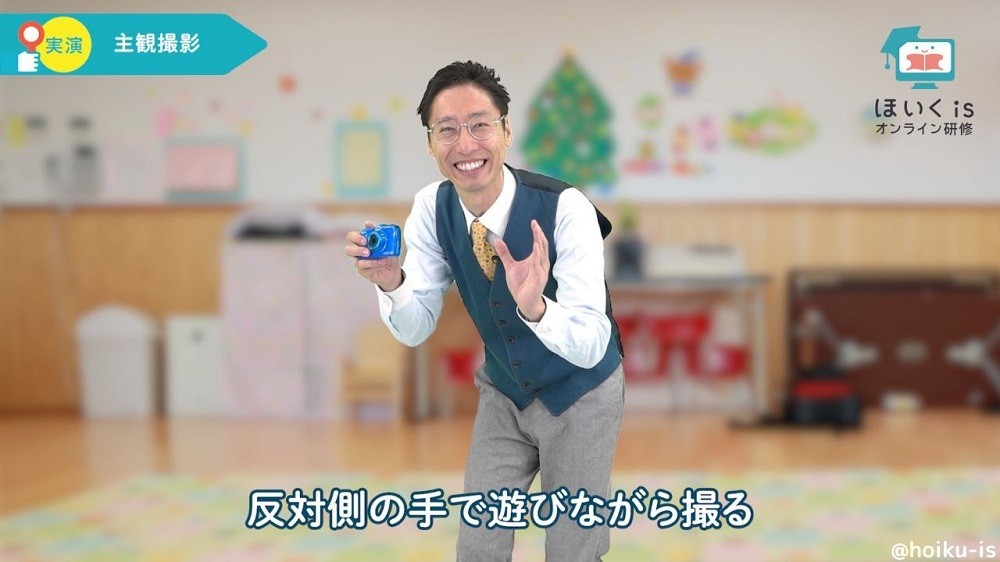 撮影のポイントを実演するえがお先生