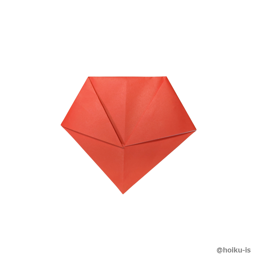 左の角も同様に折る