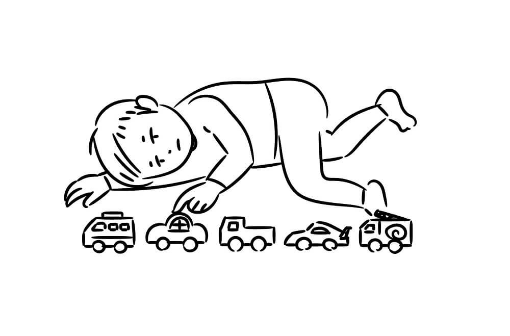 車を並べている子どもの画像
