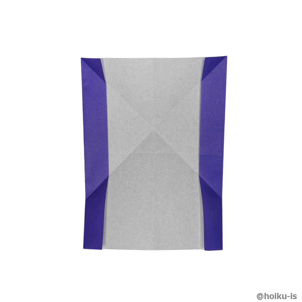 上の辺を左の辺にあうように折る