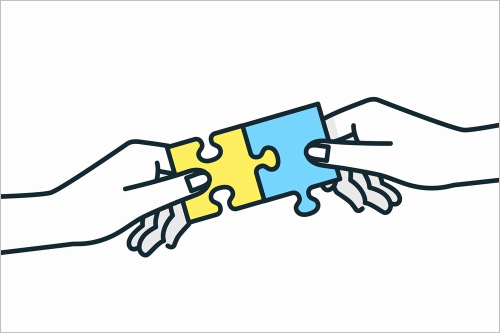 パズルのピースをはめているところ