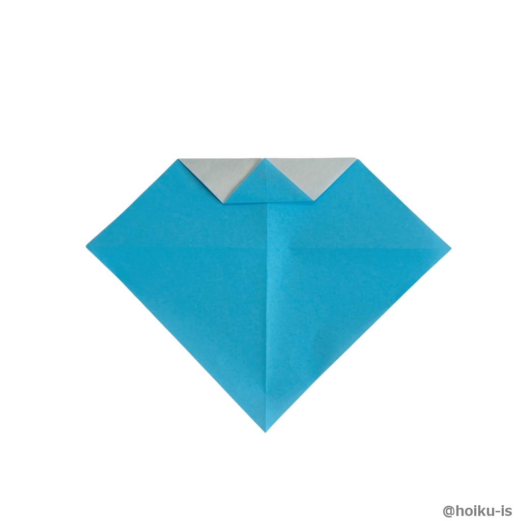 ⑥で折った角を折り上げます