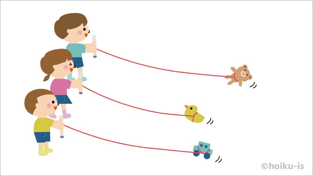 糸巻き競争をする子ども